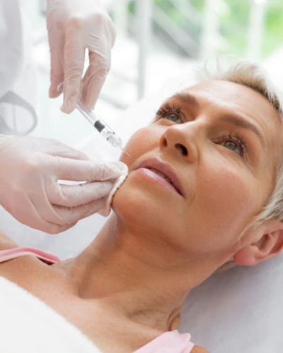 woman undergoing Cosmetic treatment with facial injection for Anti-Ageing Treatment.